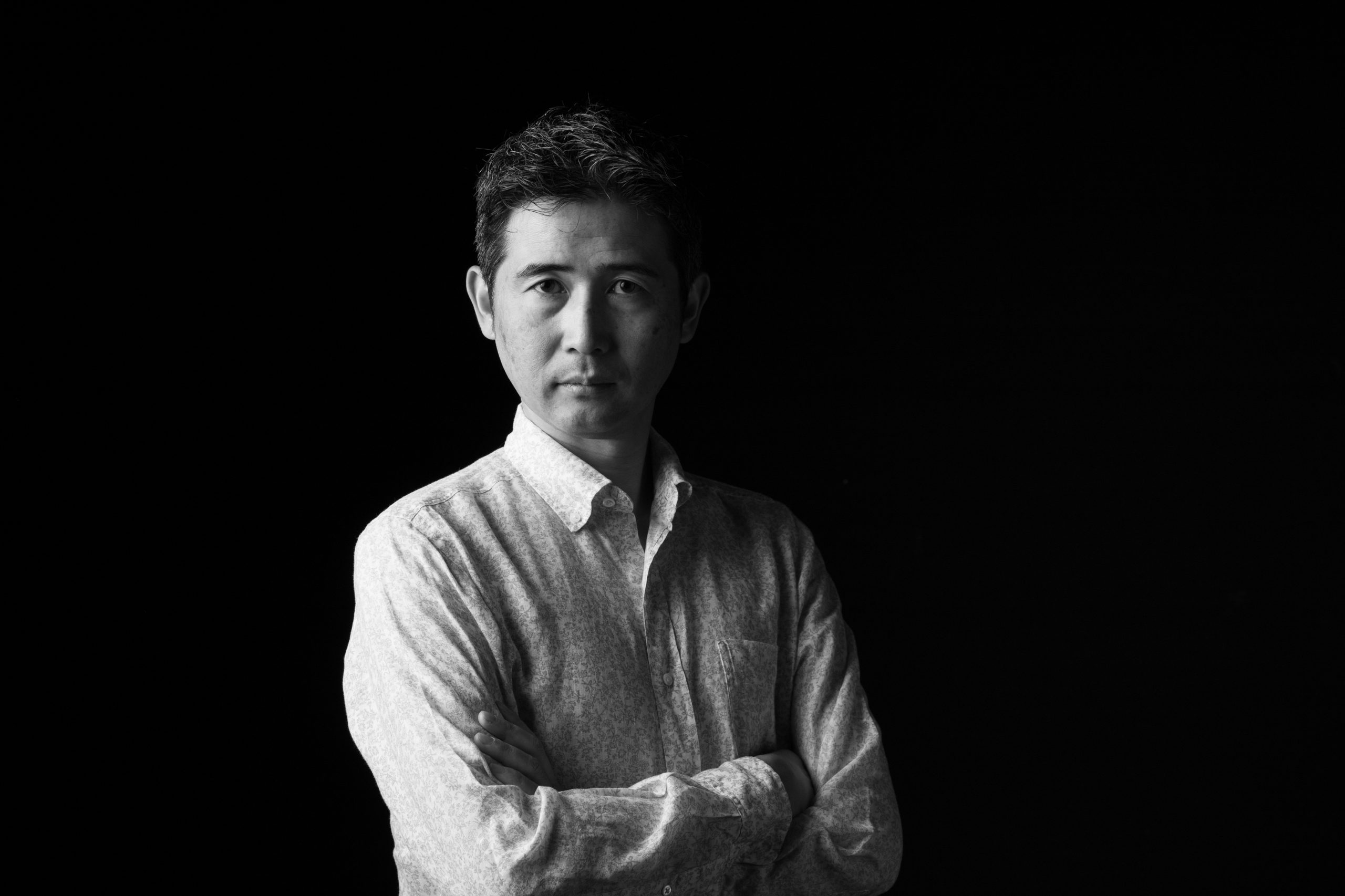 小川 健三の様子